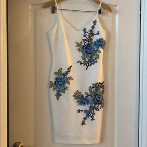 White w/ beautiful blue flowers mid length dress